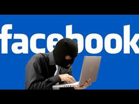 man with mask typing on a computer, name 'Facebook' in background